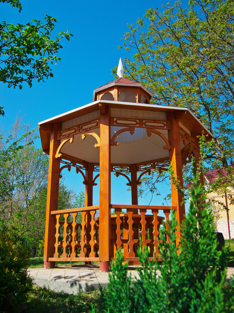 This wooden gazebo has a nice clean finish and is stained with a rich wood color. This attractive gazebo is finished with beautiful details that increase its design appeal. This wooden gazebo has a nice clean finish and is stained with a rich wood color. This attractive gazebo is finished with beautiful details that increase its design appeal.