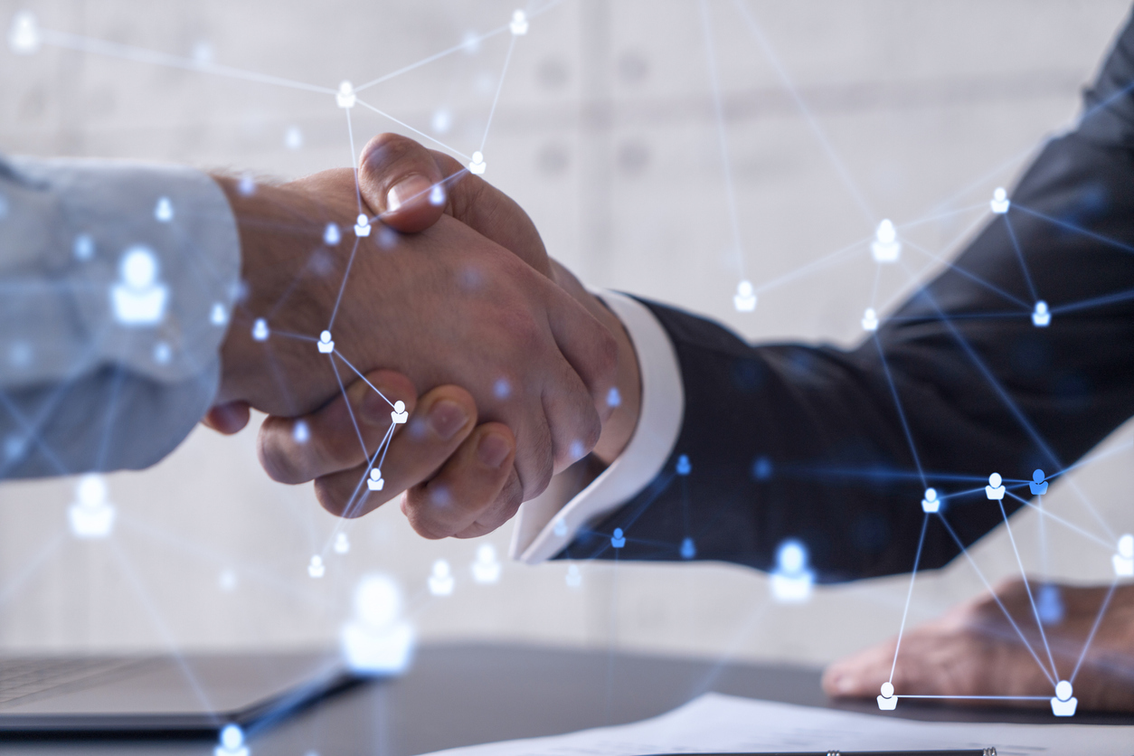 two men shaking hands