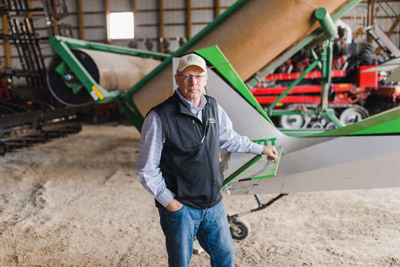 Bob Metz and the plane he uses to monitor his crops from the air.