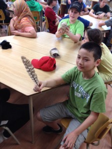 Lucas with a hawk feather