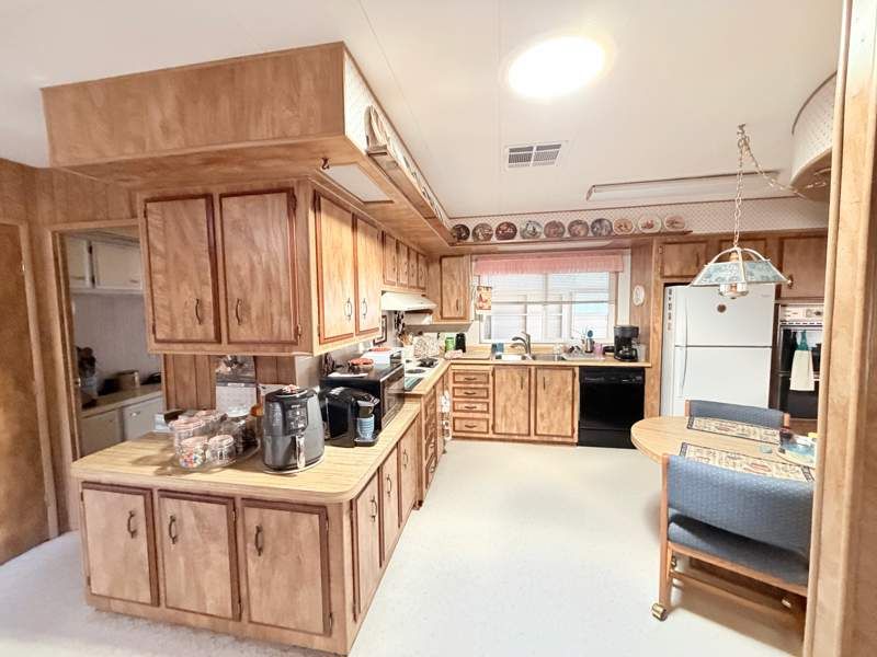 3300 E. Broadway Rd. #302