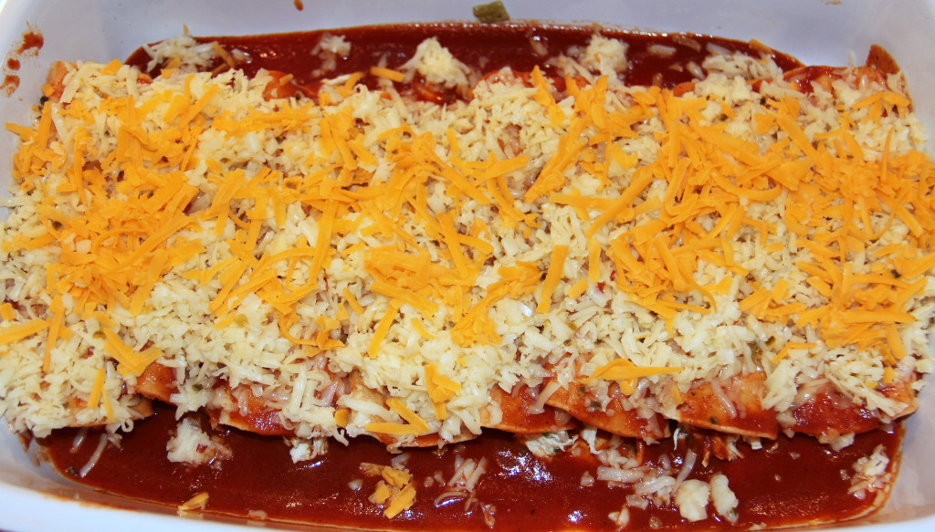 Chicken Enchiladas are a family favorite and a great make-ahead dish for a party—this recipe uses cream cheese to make the enchiladas extra creamy and delicious!