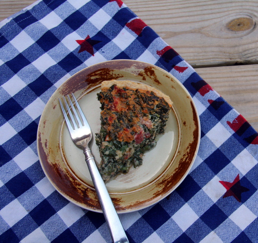 Tomato, Spinach and Cheese Quiche--an Italian herb flavored quiche with Parmesan, Gruyere, and bacon!