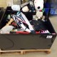 LOT # 864 TSA BOOKCASE OF VARIOUS ITEMS
