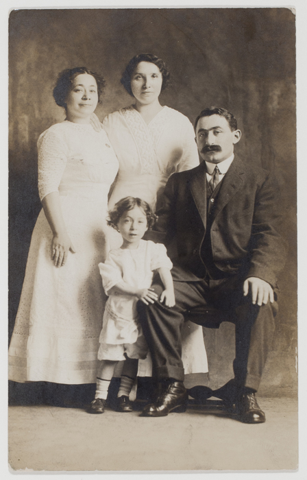 [Two Unidentified Women, Man, and Child]