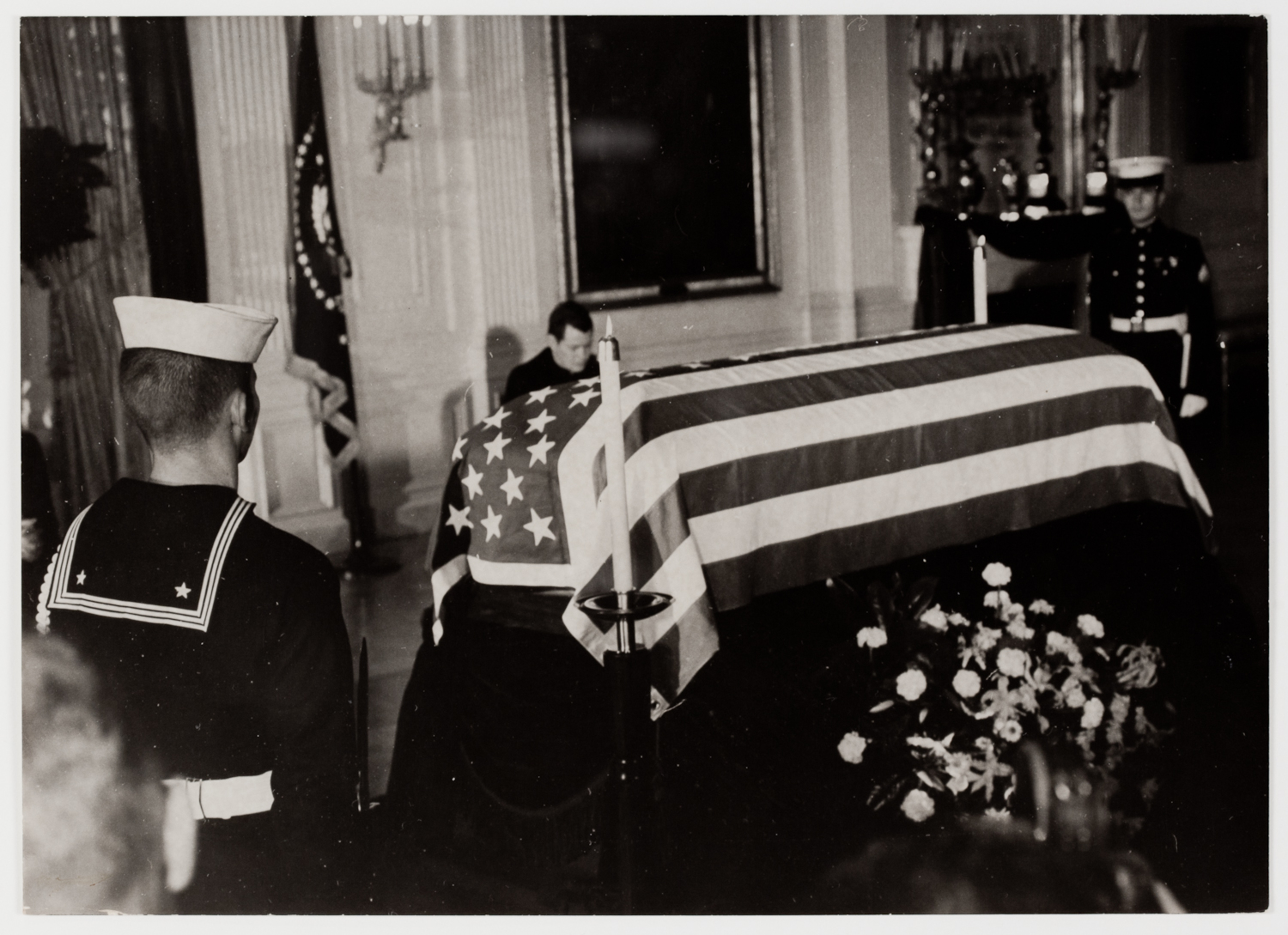 [The casket of President John F. Kennedy in the East Room of the White