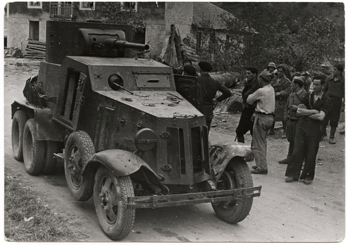 [Republican soldiers stand next to tank, Mount Sollube, Spain]