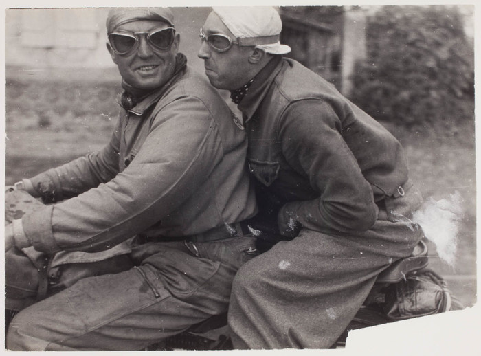 [Two men on a motorcycle, Tour de France, France]
