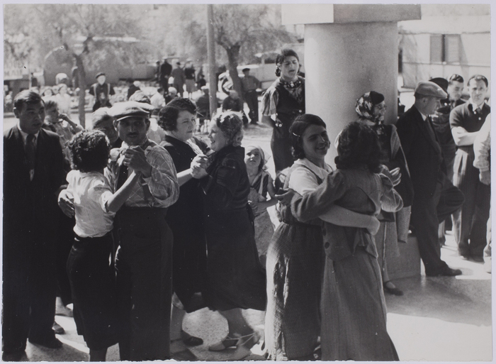 [People dancing in a covered market, possibly South of France]