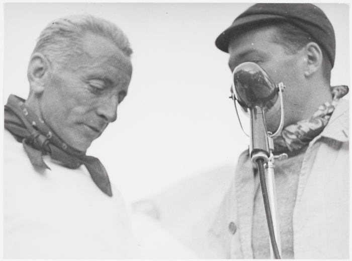 [Two men speaking by microphone, Tour de France, France]