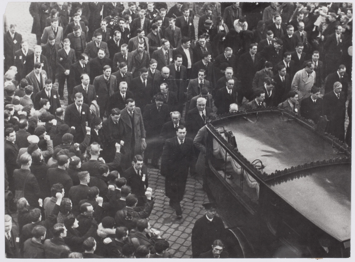 [Crowd of mourners walk with hearses, Clichy, France]