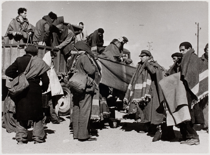 [Men getting in truck, French Internement Camp, Le Barcarès, Spain]
