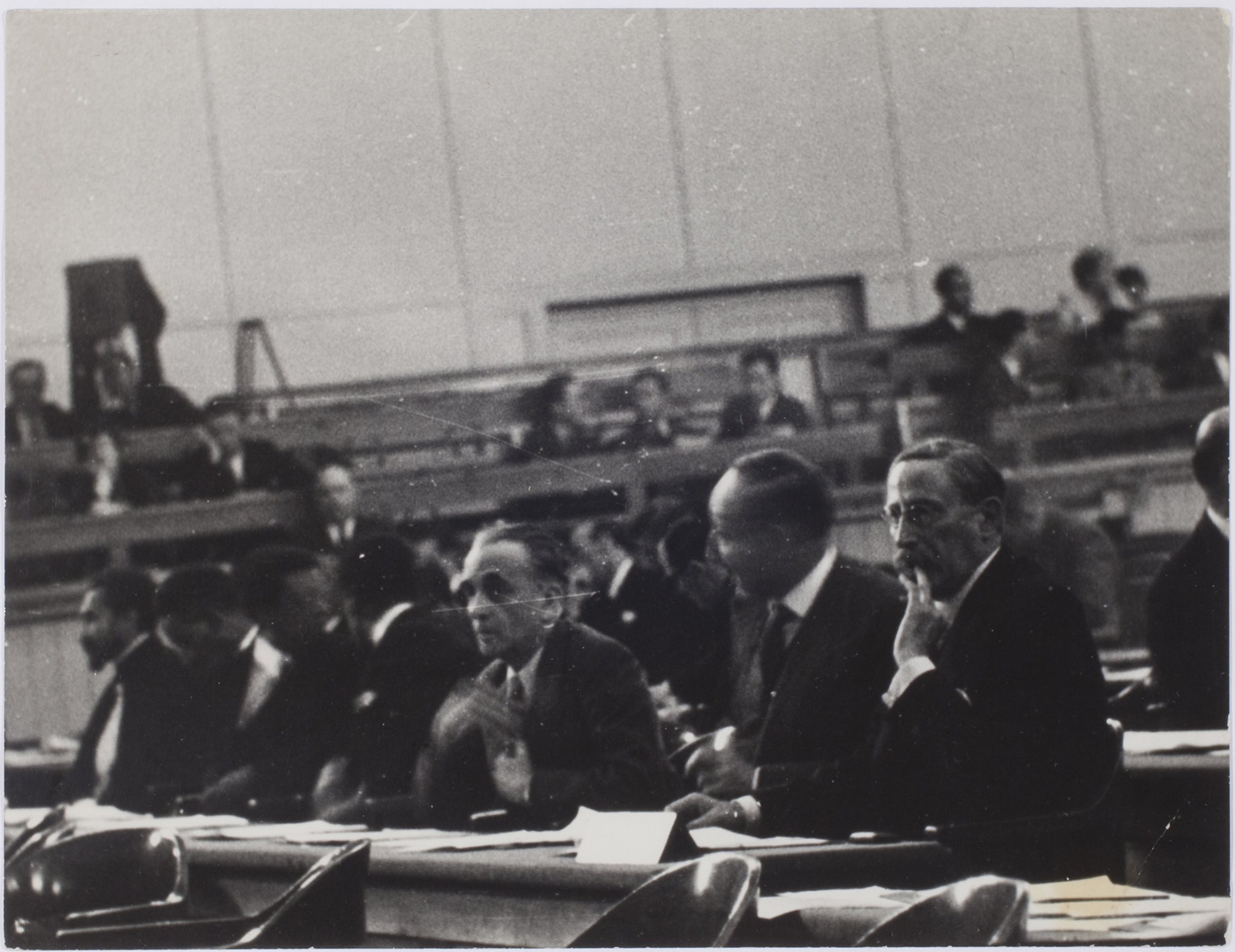 [Speakers behind a table, League of Nations, Geneva] International