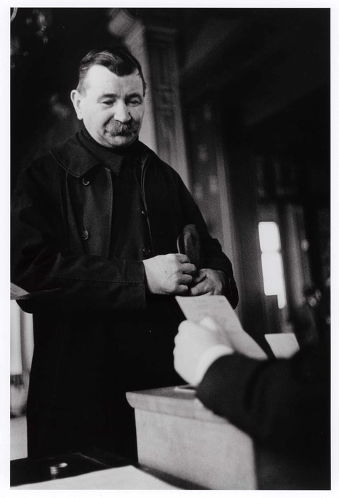 [Man voting in the election run-offs that would put into power the leftist-liberal Popular Front coalition government, Saint-Denis, France]