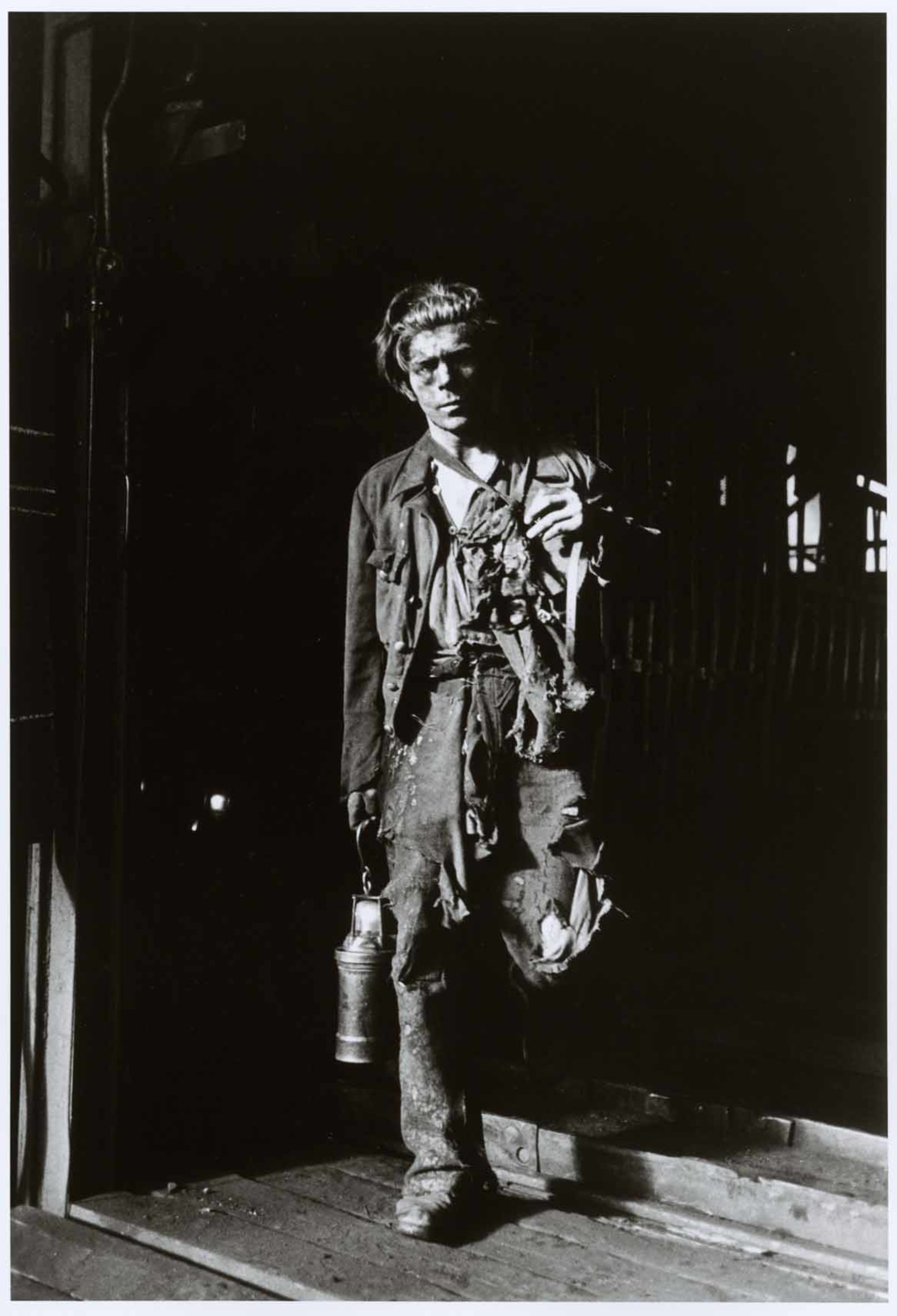 [Man dressed in rags, Poland] International Center of Photography