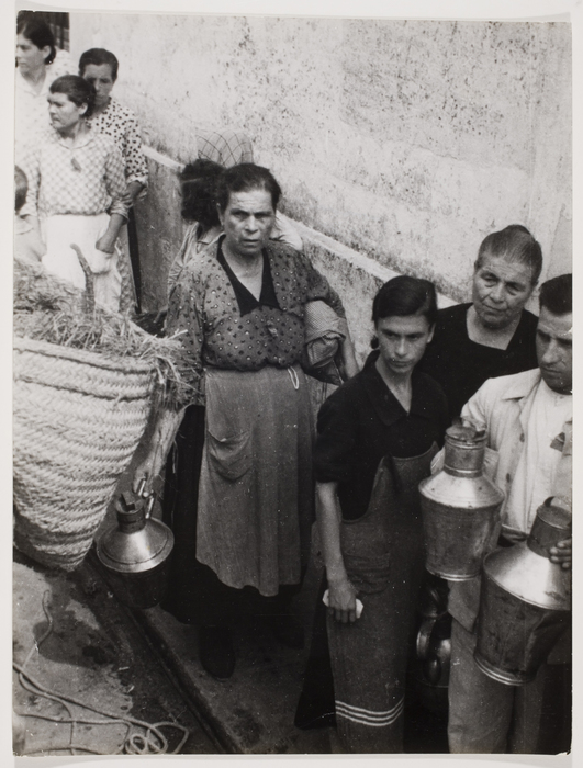 [Women waiting in line for their daily ration of milk, Spain]