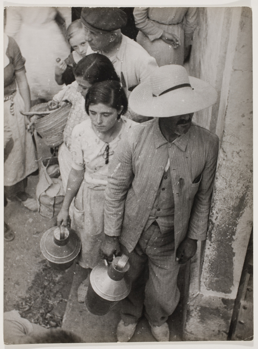 [People waiting in line for milk, Spain]