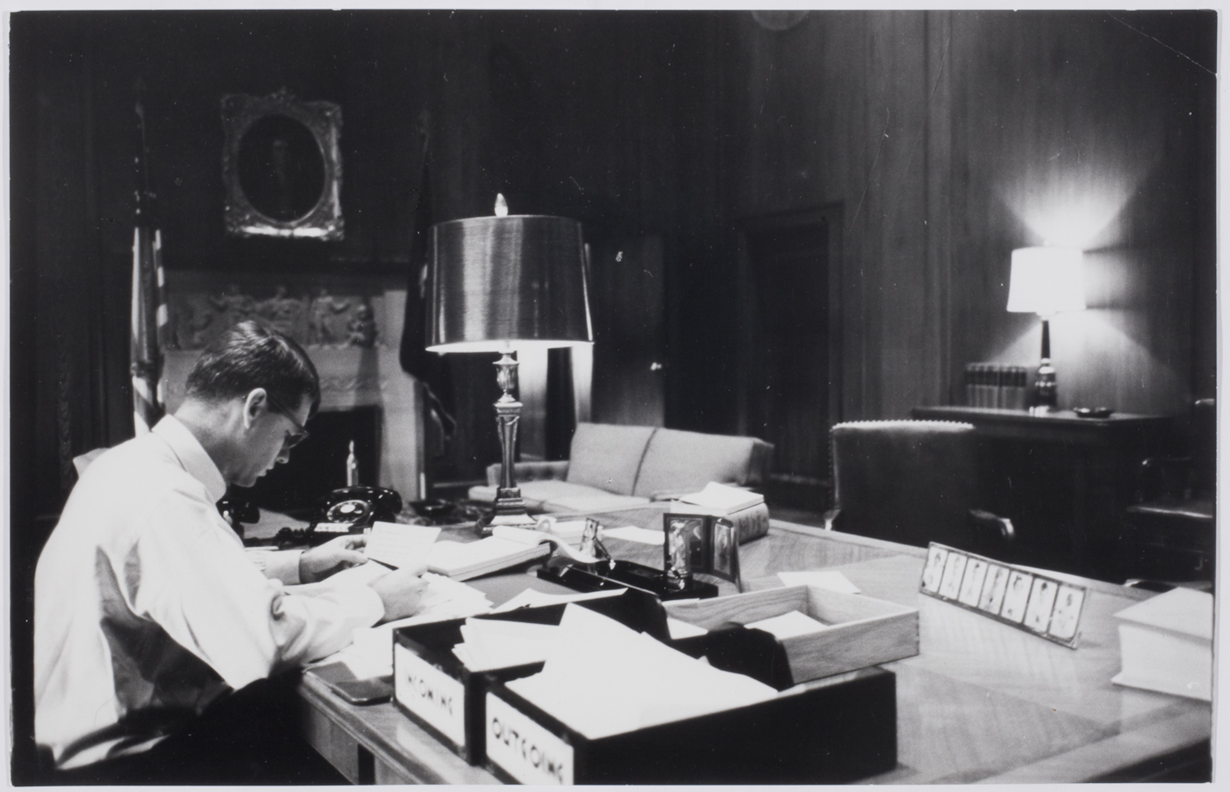 [Attorney General Robert F. Kennedy in his office with an advisor