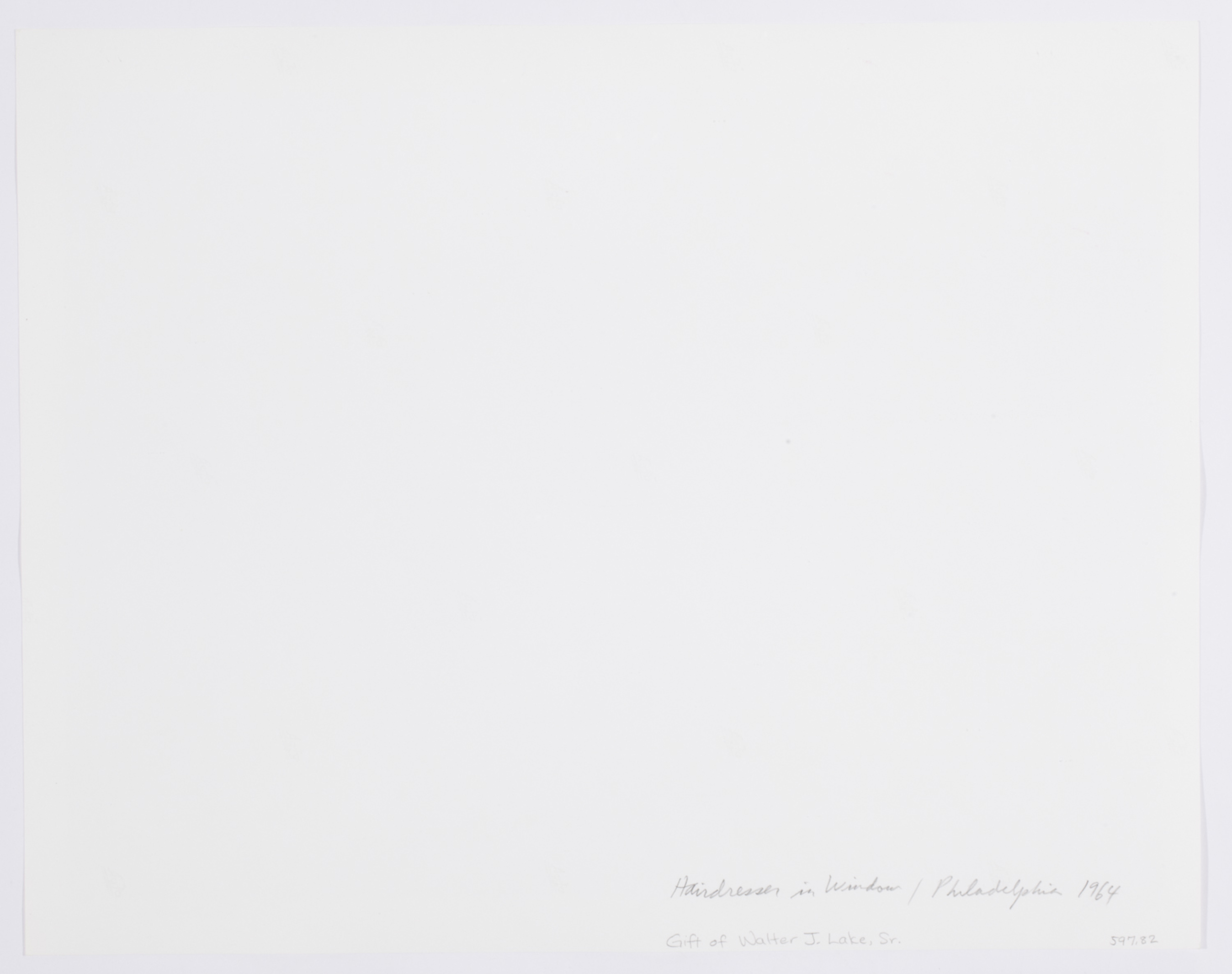 Hairdresser in Window / Philadelphia International Center of Photography