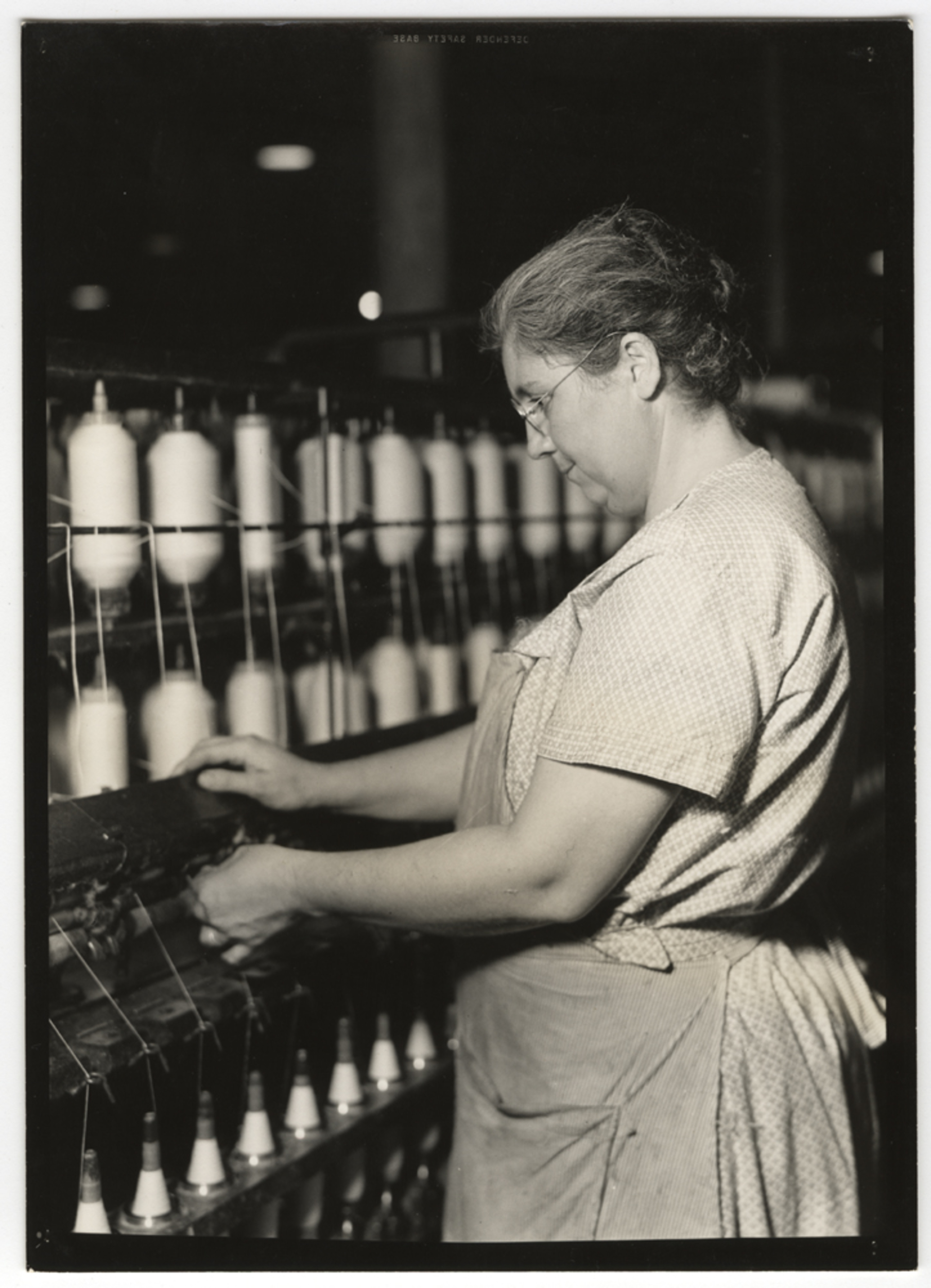 [Highlyskilled worker spinning, Pickett Yarn Mill, High Point, North