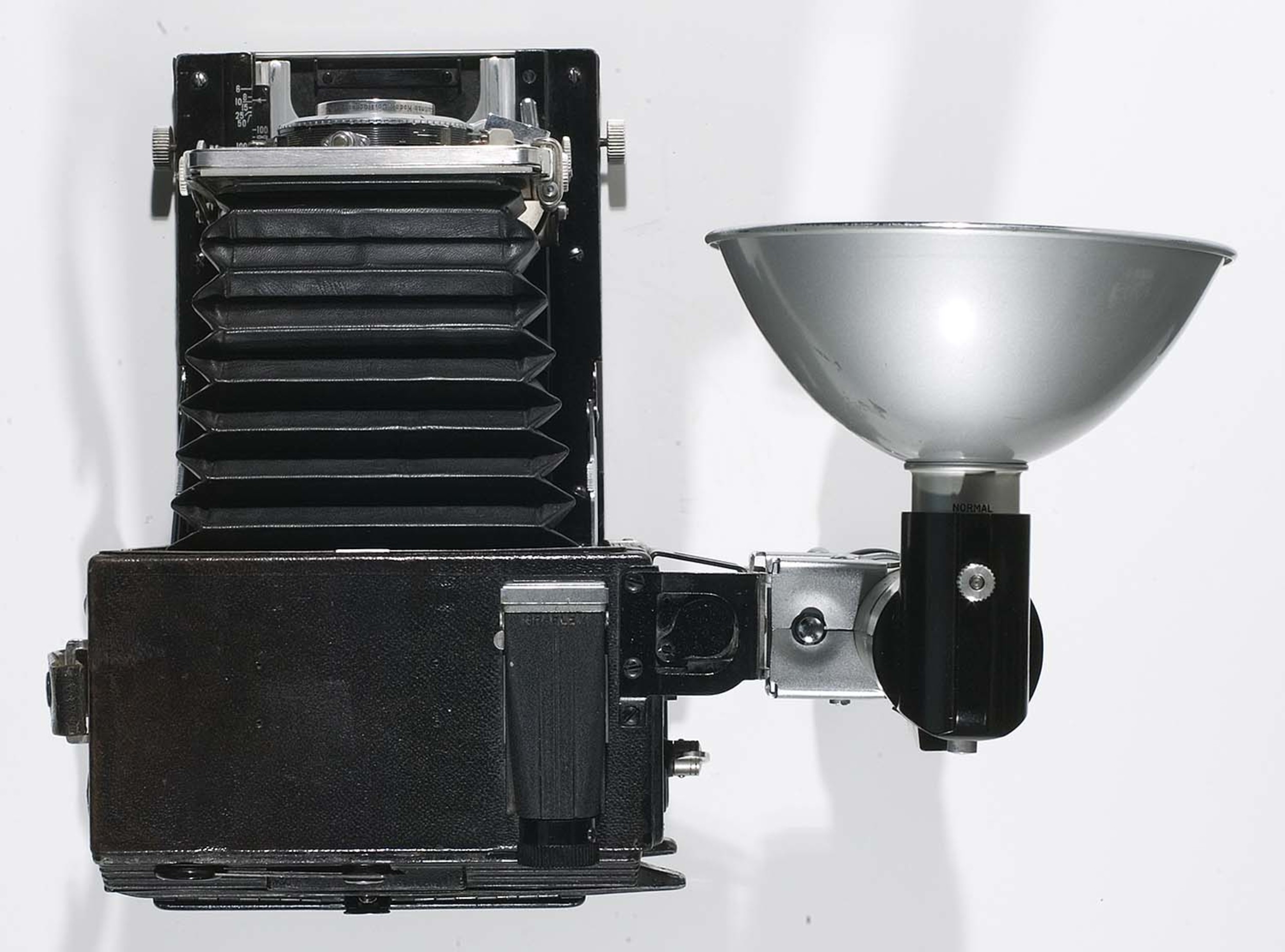 [Weegee's Speed Graphic camera] | International Center of Photography