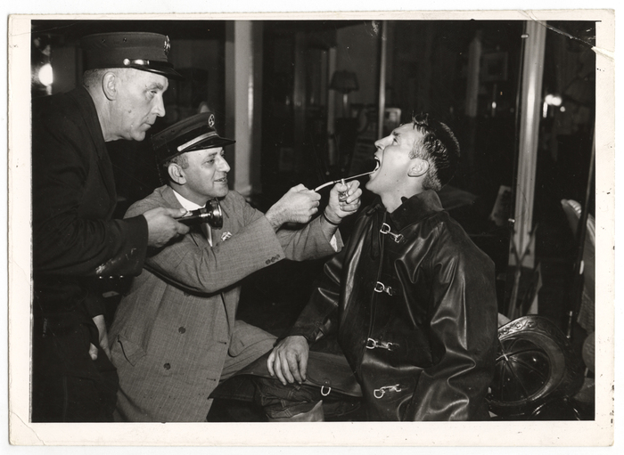 "One doctor devoted himself to administering soothing treatment to firemen whose throats were irritated by smoke."