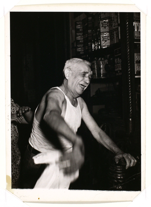 [Landlord Henry Geller weeping over the loss of his first-floor tobacco shop, which was destroyed by a fire, New York]