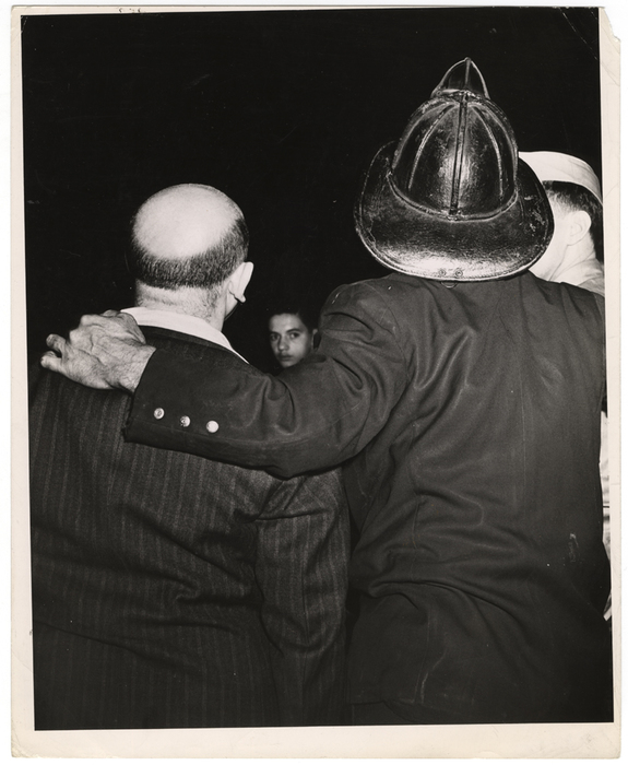 "This bald gent is a fire 'buff.' They show up often to watch fires and lend firemen moral support."