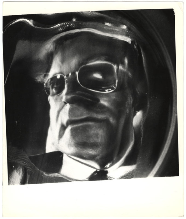 [Distortion of Peter Sellers as Dr. Strangelove]