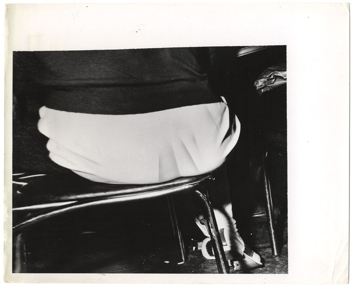 Woman sitting on chair (distortion)