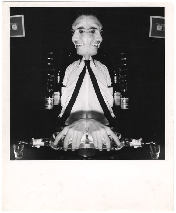 Man pouring drink (distortion)