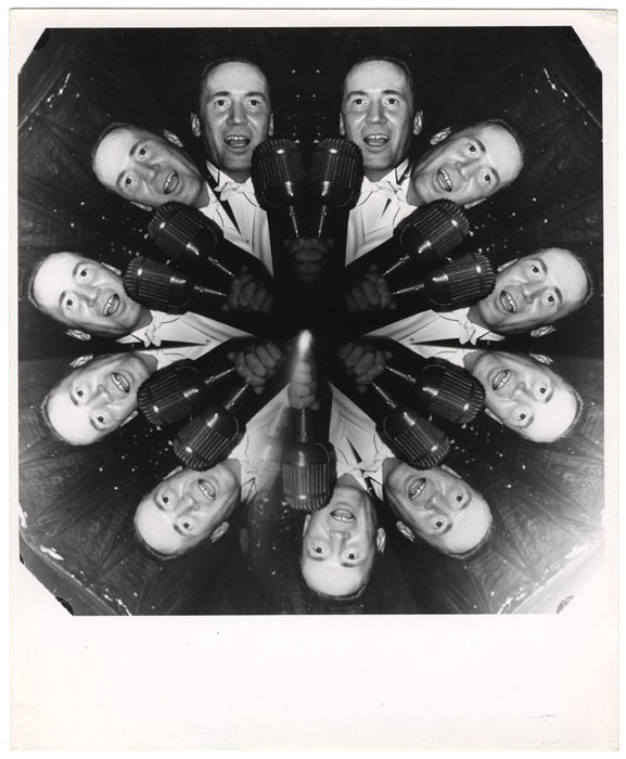 Man singing into microphone (distortion)