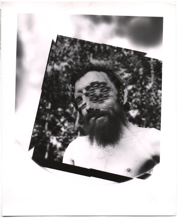 Multi-eyed man with beard (distortion)