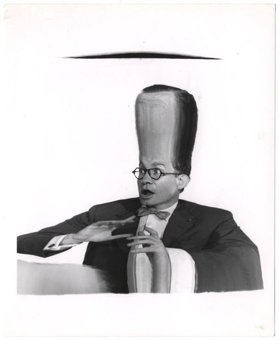 Man with large head looking right (distortion)