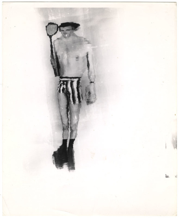 Man posing with tennis raquet (distortion)