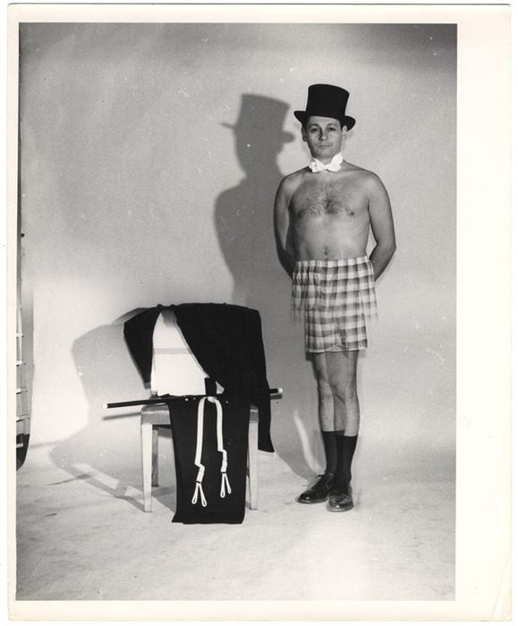 Man wearing top hat and boxer shorts (distortion)