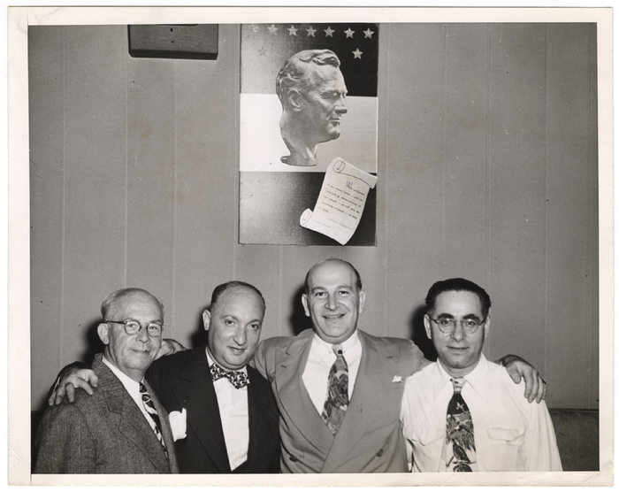 [Sammy Fuchs with three men]