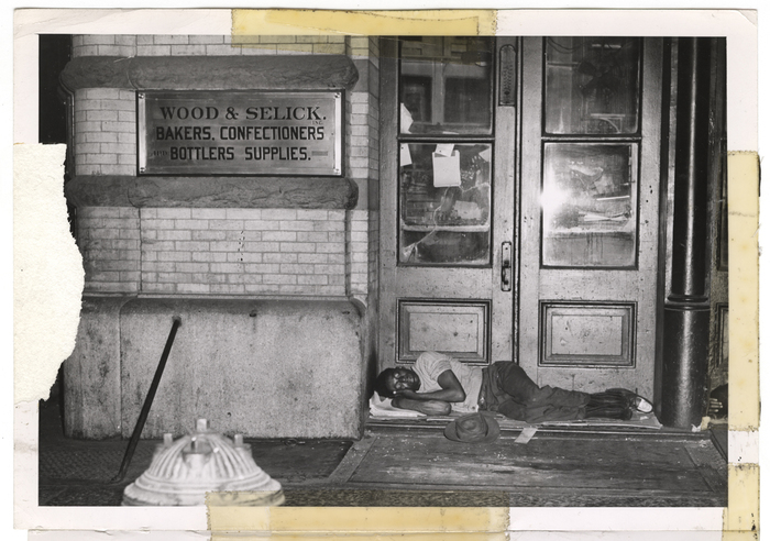 [Sleeping in front of  Wood & Selick, Inc.]