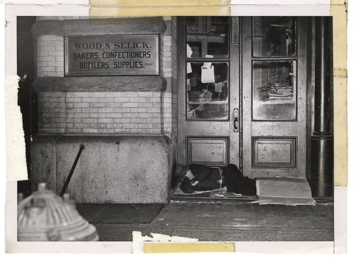 [Sleeping in front of  Wood & Selick, Inc.]