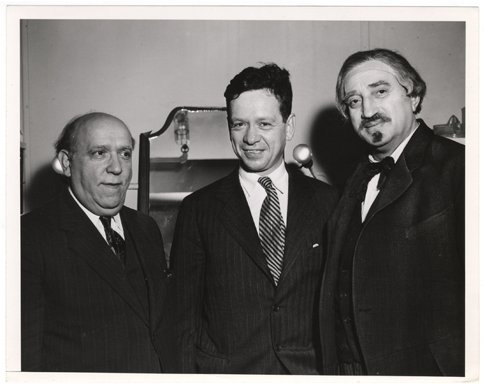 [Yiddish Art Theatre director Maurice Schwartz backstage with two men, New York]
