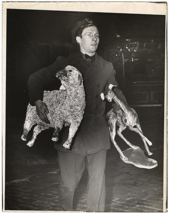 [Fireman Rescuing a Sheep and Deer]