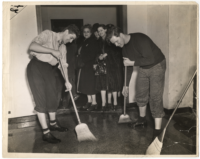 "Water sweeping down from the 17th floor, where fire started, played havoc with the 26-story building."