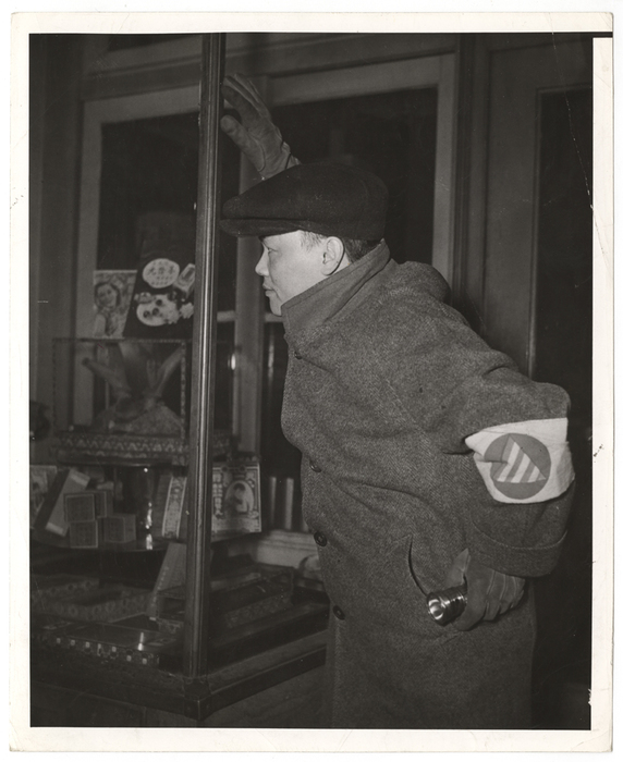 [Civilian Defense: Air raid warden]