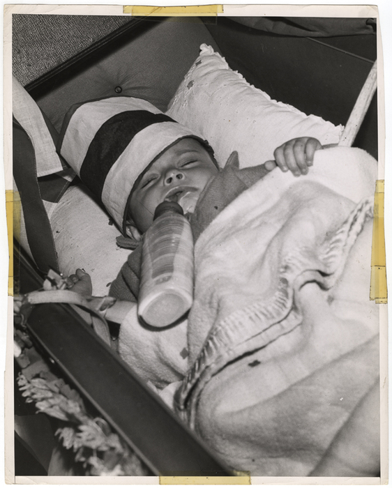 "Little Bobby De Marco, age 7 months, at Second Ave. and 9th St., East Side, Tuesday night, after 7 PM"