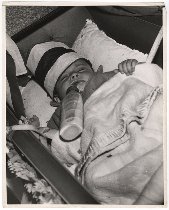 "Little Bobby De Marco, age 7 months, at Second Ave. and 9th St., East Side, Tuesday night, after 7 PM"