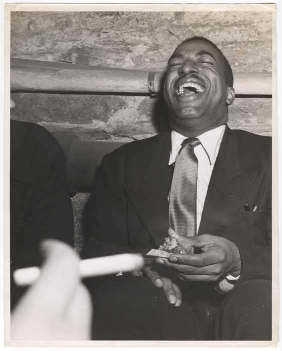 [Man laughing at the sub-cellar ball]