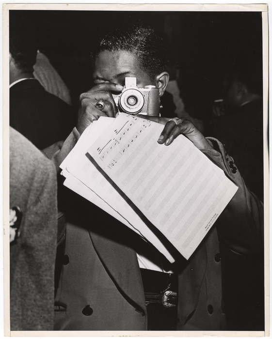 [taking a photograph of the photographer]