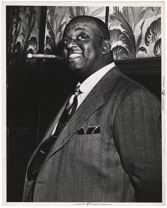 [Saturday night: man smoking a cigar]