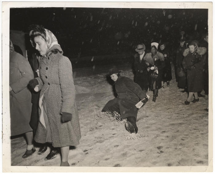 "Oops - another pedestrian loses his footing on slippery drifts."