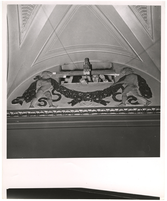 [man in booth of a movie theater]